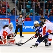 GANGNEUNG, SOUTH KOREA - FEBRUARY 22: USA's Dani Cameranesi #24 stickhandles the puck in on Canada's Shannon Szabados #1 with Brianne Jenner #19 chasing during gold medal round action at the PyeongChang 2018 Olympic Winter Games. (Photo by Matt Zambonin/HHOF-IIHF Images)

